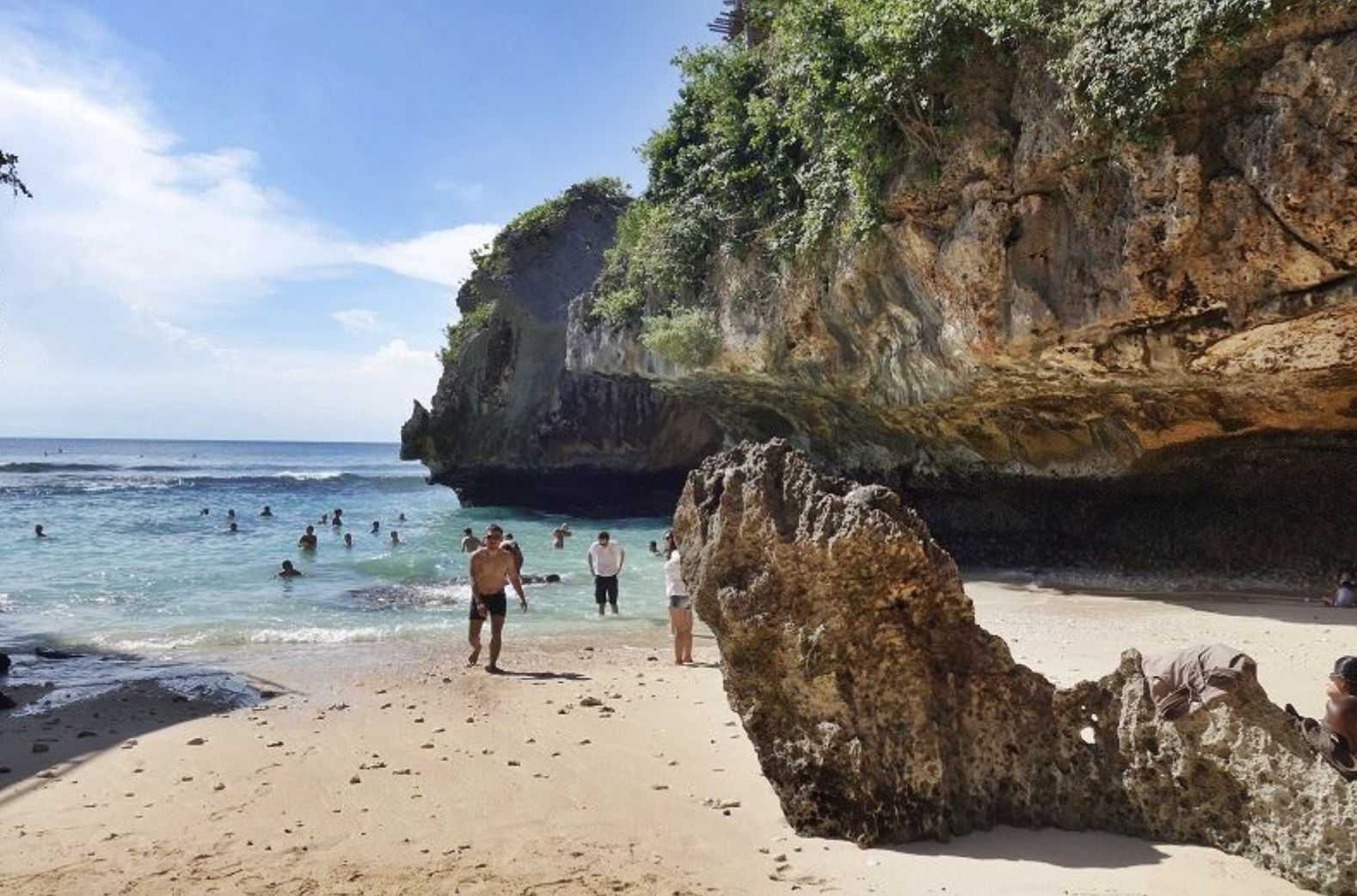 Suluban Beach Uluwatu cave entrance and ocean waves