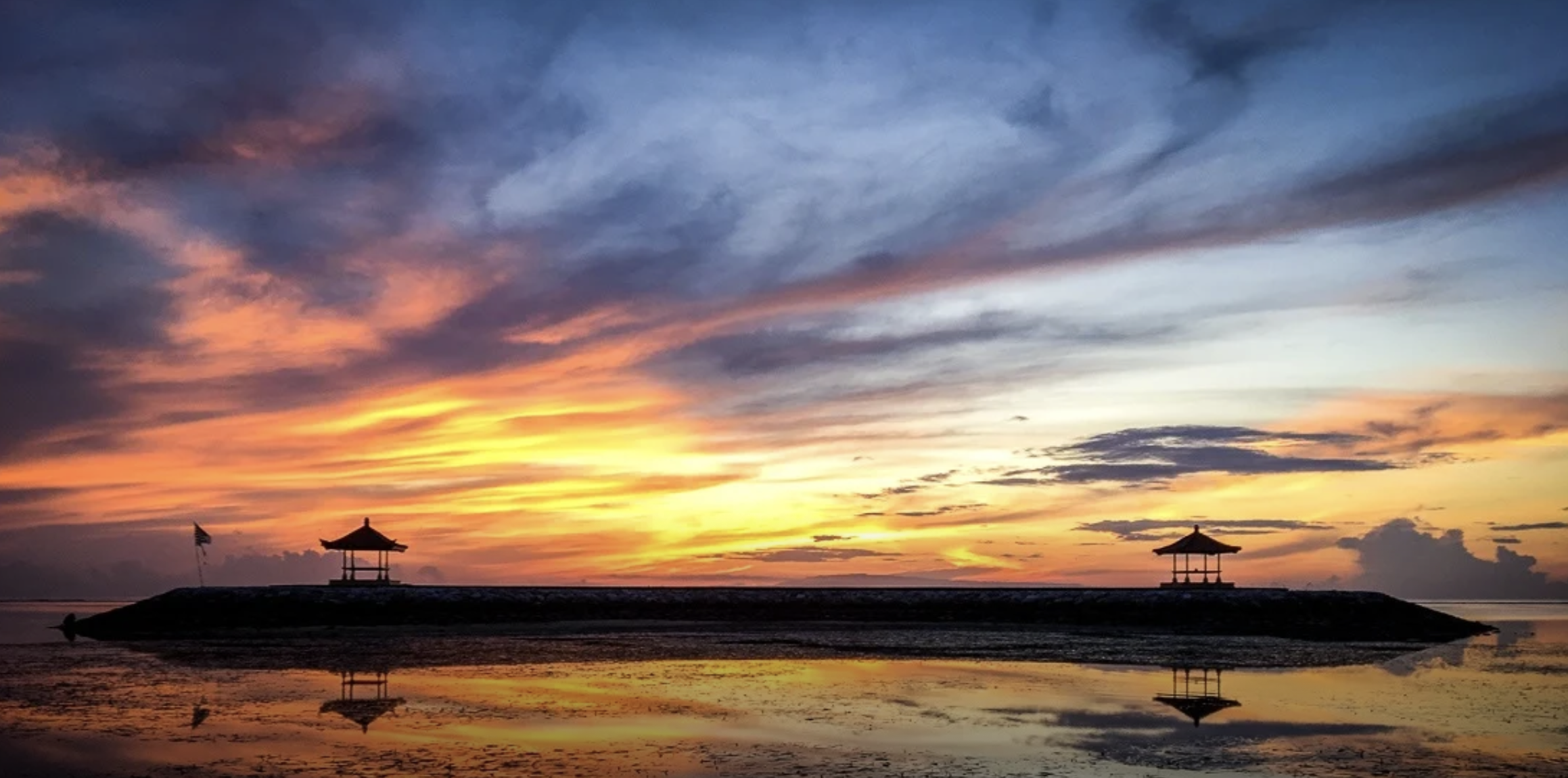 Sanur Beach sunrise and beachfront promenade Bali